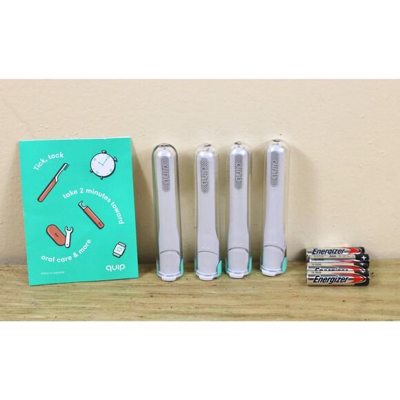 New Quip Electric Toothbrush Head Lot of 4 Refill Replacement 4 Batteries Sealed - Picture 3 of 3